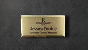 Gold metal beveled name tag with a brushed gold metal face, with logo, name and title, 1.5" x 3"